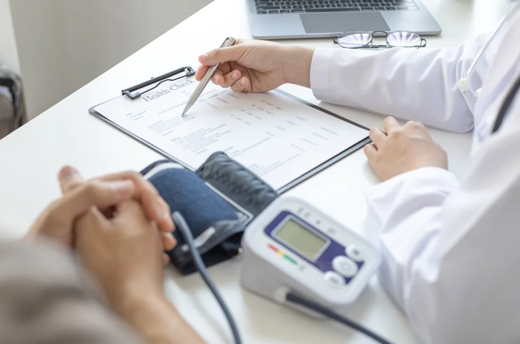 Photo of doctor reviewing a chart